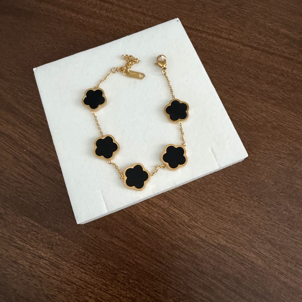 Elegant Gold and Black Flower Bracelet